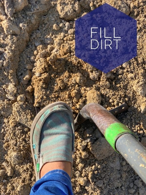 brown fill dirt and shovel